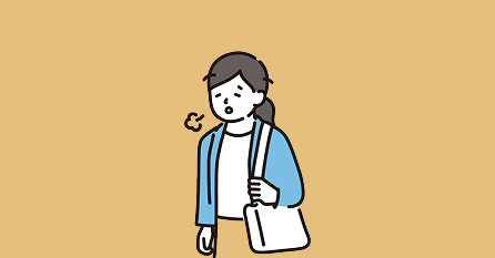 疲れてため息をつく女性